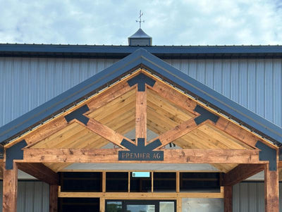 Image of our truss bracket sets installed on a new post and beam barn